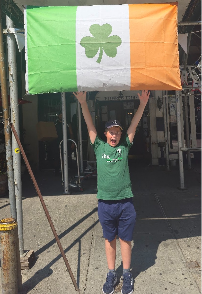 Jake proudly holding the Irish flag